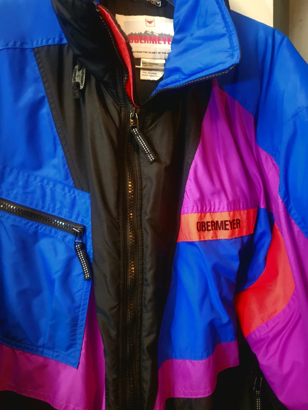 Obermeyer Men's Ski Jacket in Blue, Purple, Black with Pink Accents
